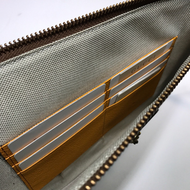 G*u*i clutch bag